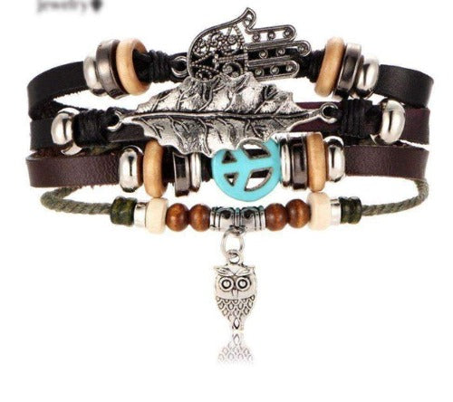 Beaded Bracelet With Silver Hamsa Hand, Peace Sign, Leaf and Owl Charms Brown